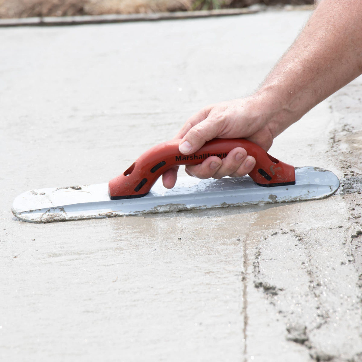 Marshalltown magnesium float used with a trowel for a consistent surface.