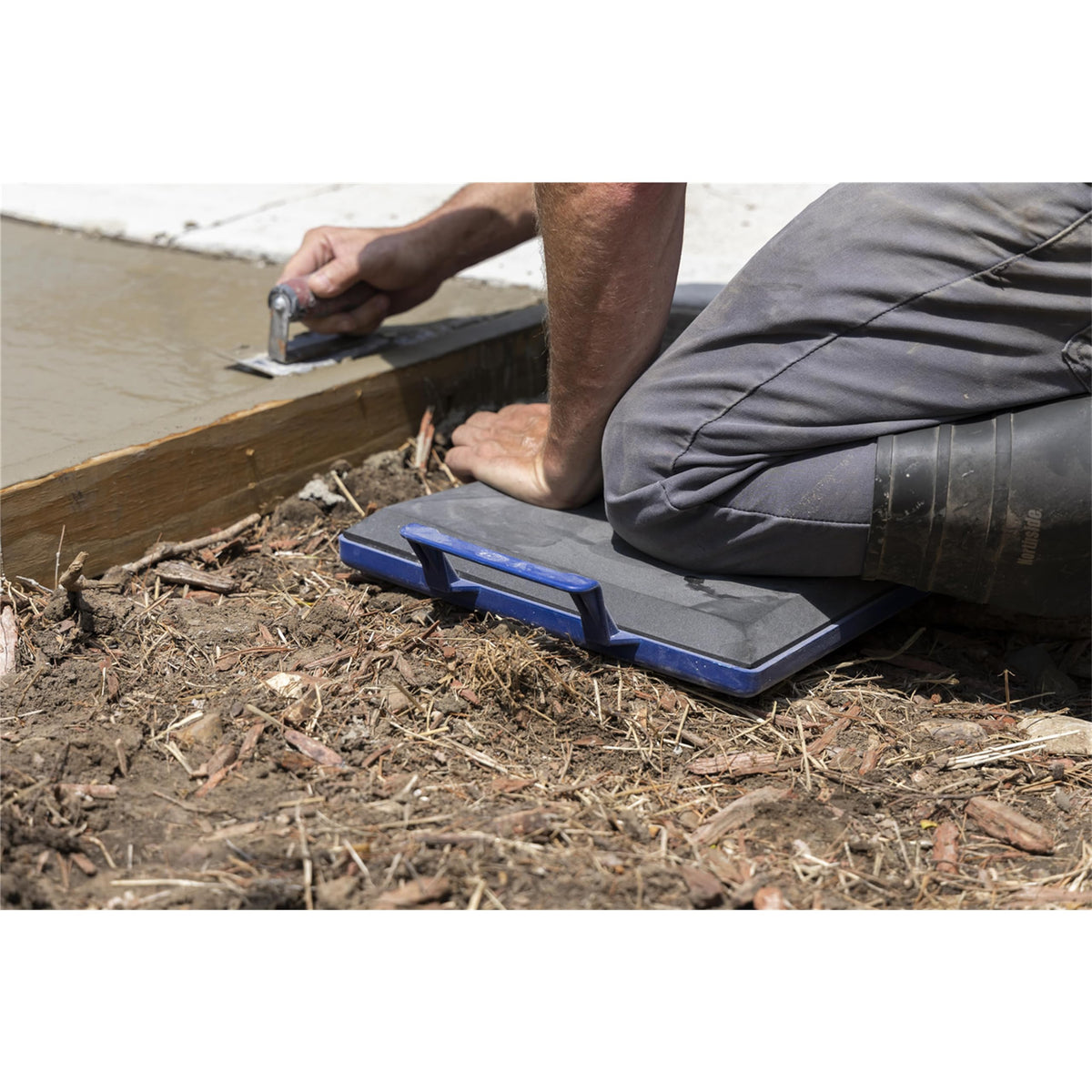 Marshalltown foam kneeler on fresh concrete surface during use