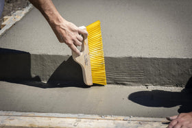 Marshalltown slab texturing with 3-inch bristles creates light, uniform patterns