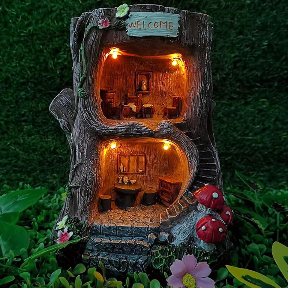 MARYTUMM solar light fairy tree house on base lights outdoor evenings with warm glow.