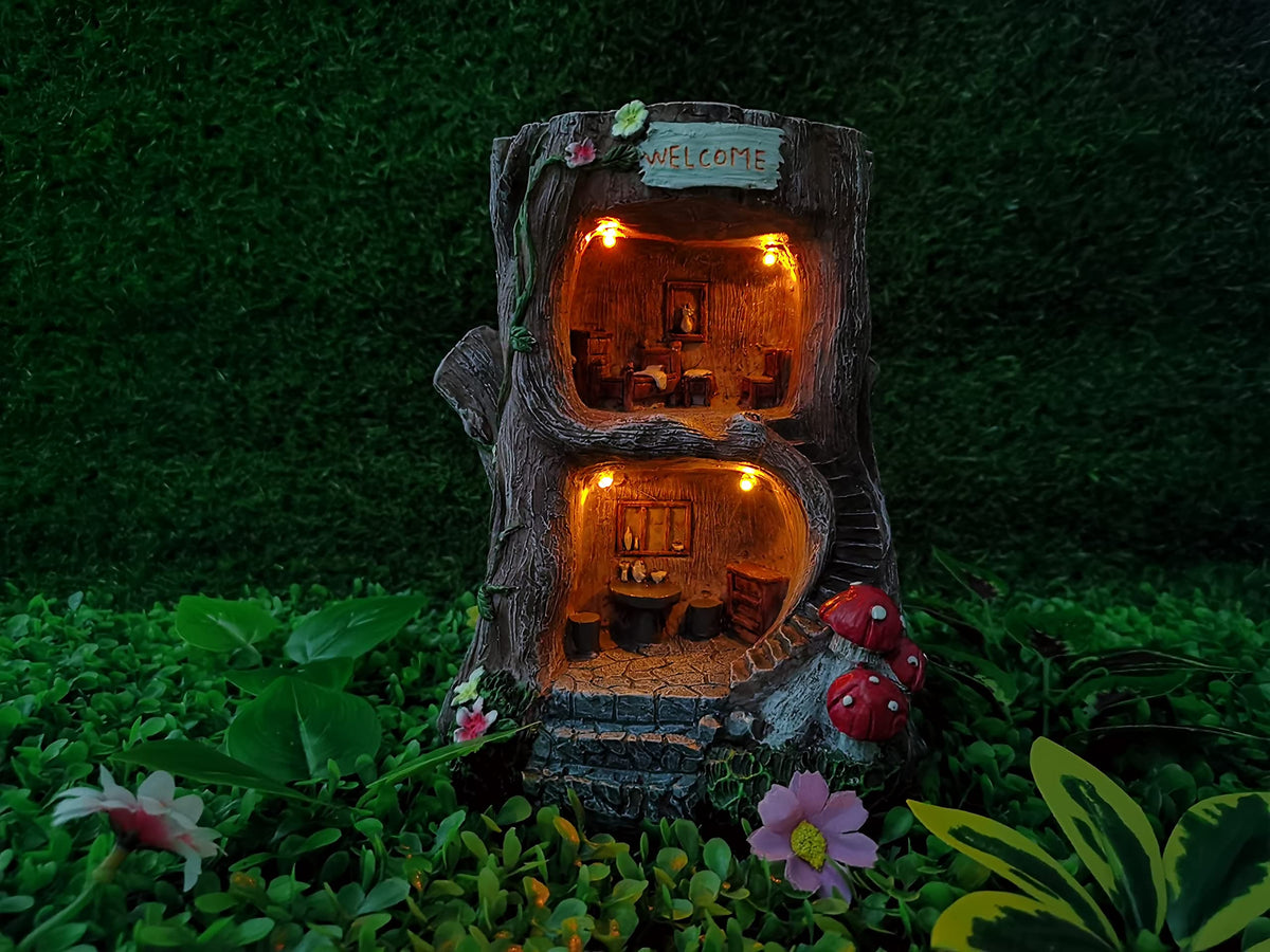 MARYTUMM tree root garden statue with LED lights for nighttime ambiance.