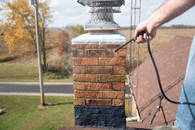 MasonryDefender chimney sealer bottle ready for easy water-based application