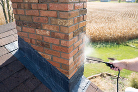 Exterior chimney and wall surfaces protected from water intrusion