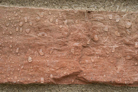 MasonryDefender clear waterproof sealer protects brick and concrete without altering appearance
