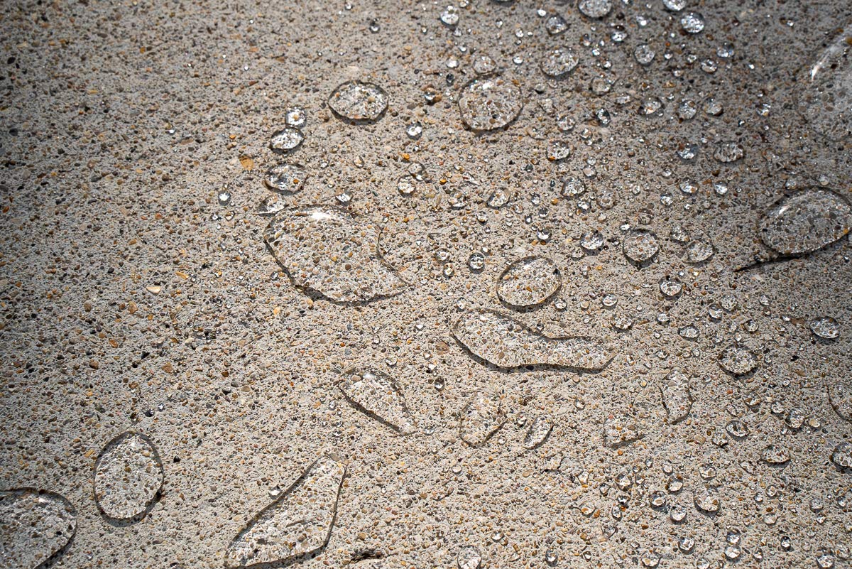 MasonryDefender penetrating sealer applied with pump sprayer for even coverage
