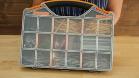 Massca hardware organizer dimensions 12.75 by 10 by 1.75 inches on a bench.