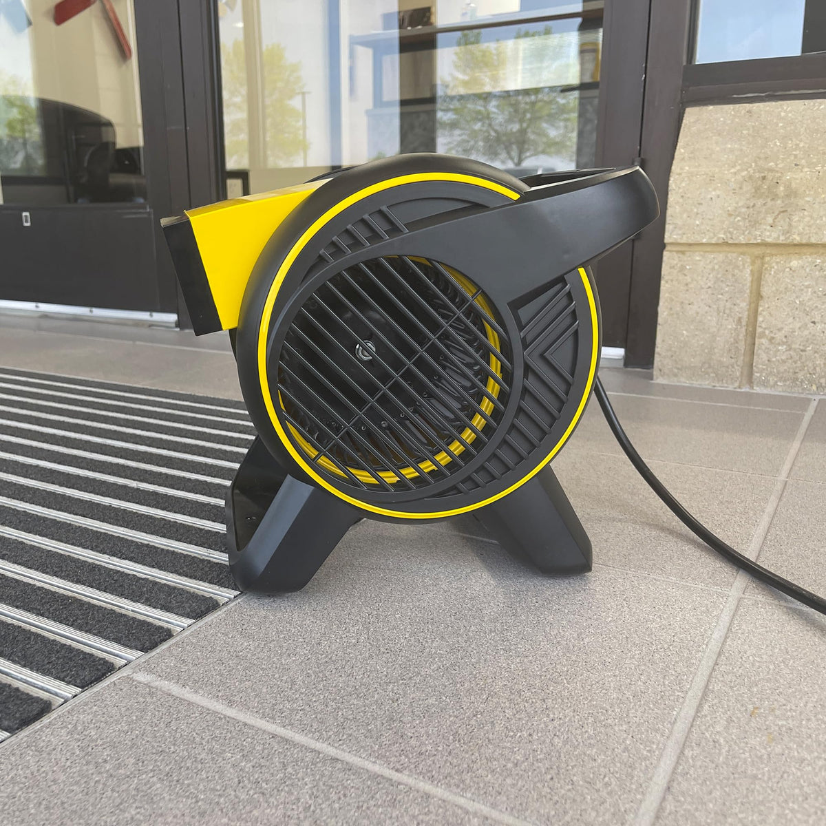 Master Heavy Duty Utility Blower drying carpets and improving airflow in tight spaces.