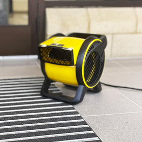 Master Heavy Duty Utility Blower in-garage setup providing versatile ventilation and drying.