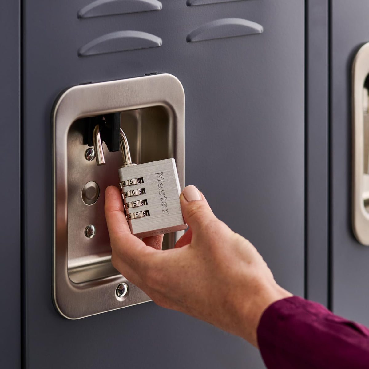 Master Lock 643EC4 indoor locker application demonstrates compact cabinet security.