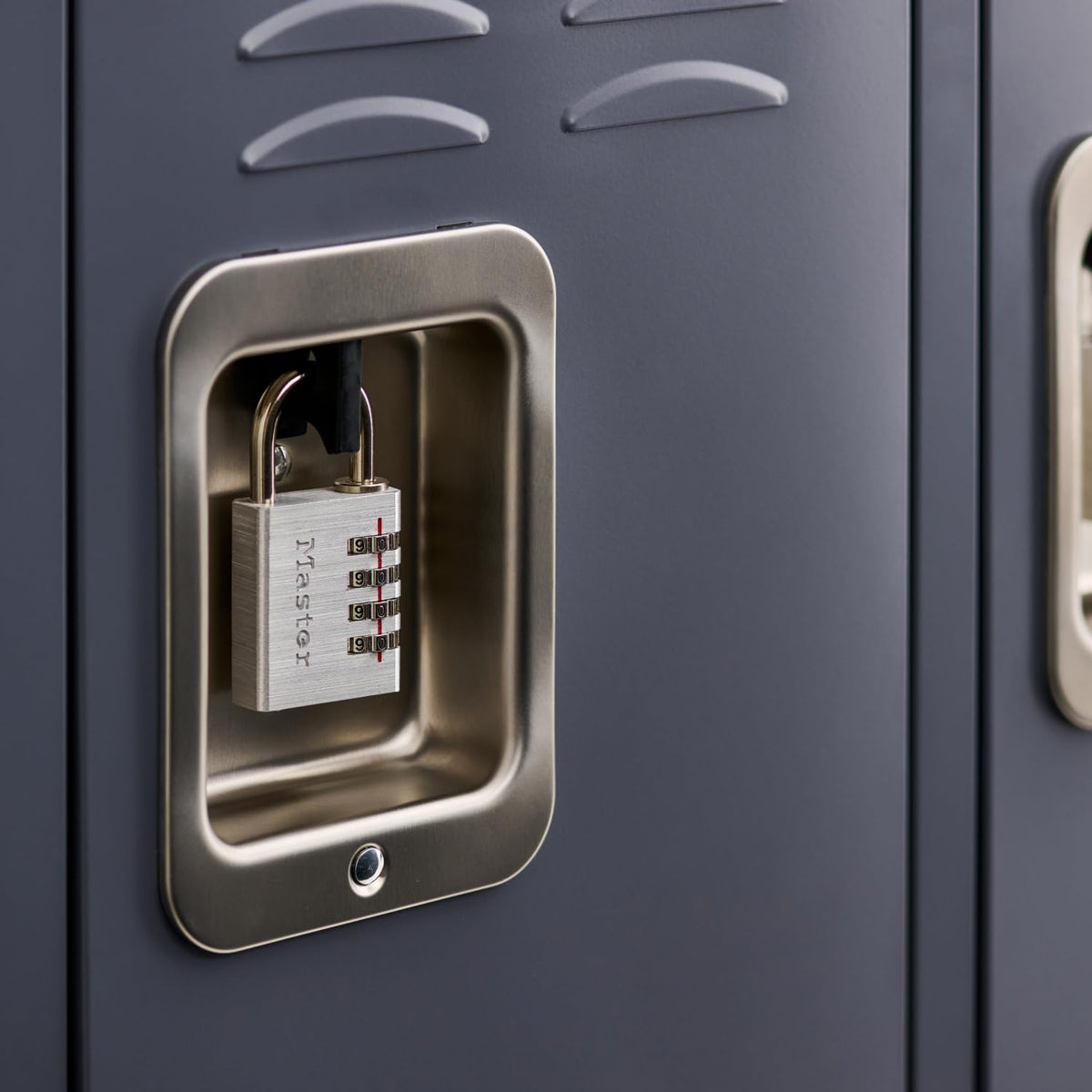 Master Lock 643EC4 metal body close-up highlights durable indoor security.