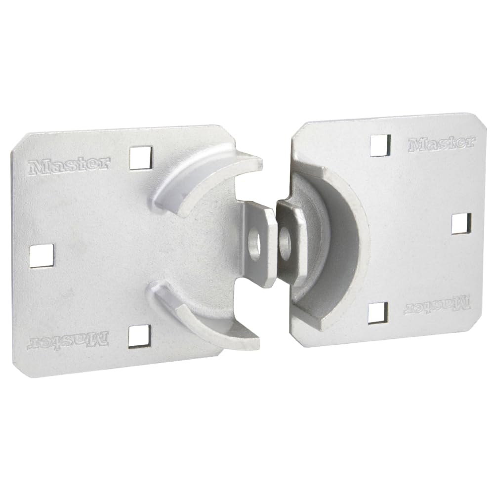 Master Lock chrome hasp lock installed on a metal door for outdoor security.