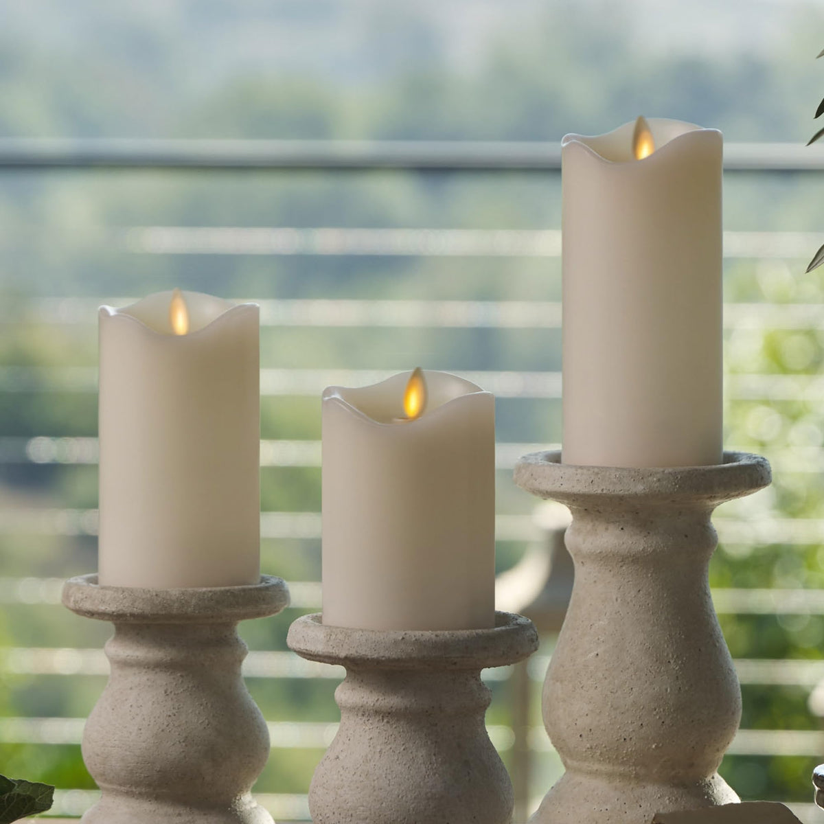 Matchless Candle Co. Luminara warm white flame enhances indoor ambiance.