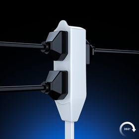 Flat plug seated against wall behind furniture for streamlined setup
