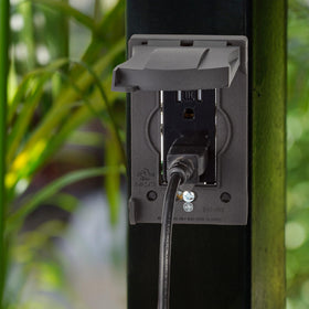 Maxxima black outdoor cover blends with exterior decor while guarding connections.