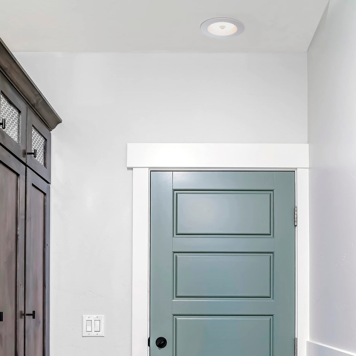 Maxxima six-inch recessed downlight showing compact diameter.