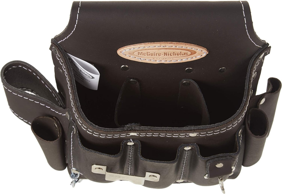 Close-up of durable oil-tanned leather stitching on McGuire-Nicholas pouch.