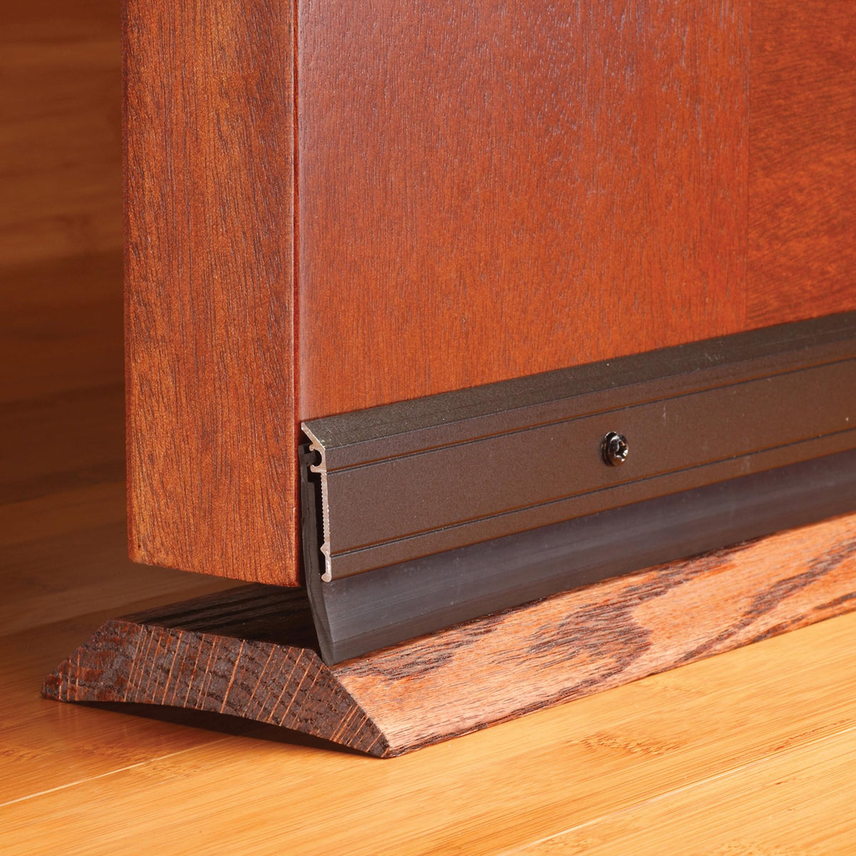 M-D door sweep seals gaps up to 3-8inch, blocking drafts and pests.