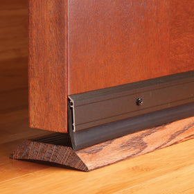 M-D door sweep seals gaps up to 3-8inch, blocking drafts and pests.