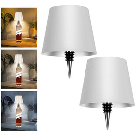 Mebaraul 2-pack wine bottle lamps on table provide warm ambient lighting.