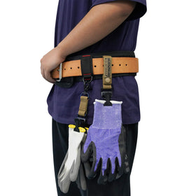 Glove belt clip attached to a firefighter's belt for easy glove retrieval