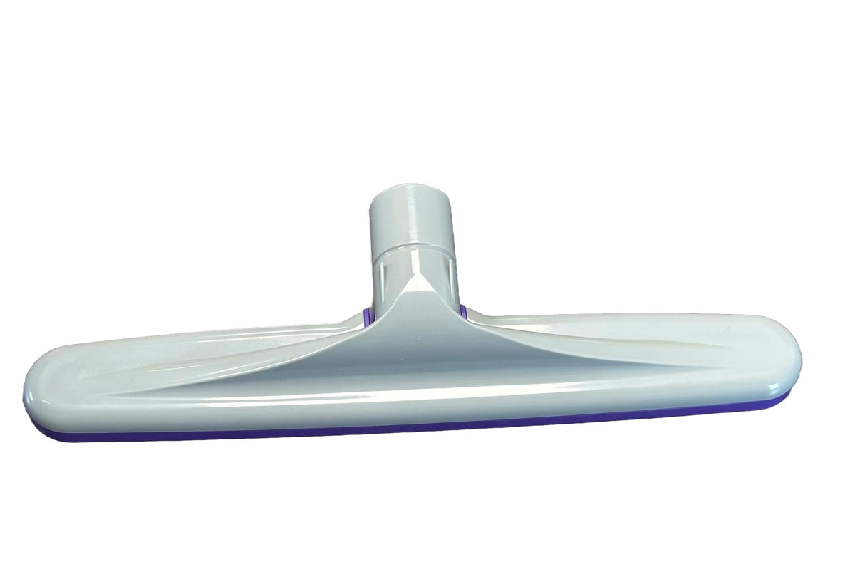 Merchandise Mecca Xover built-in shoe brush agitates carpet fibers.