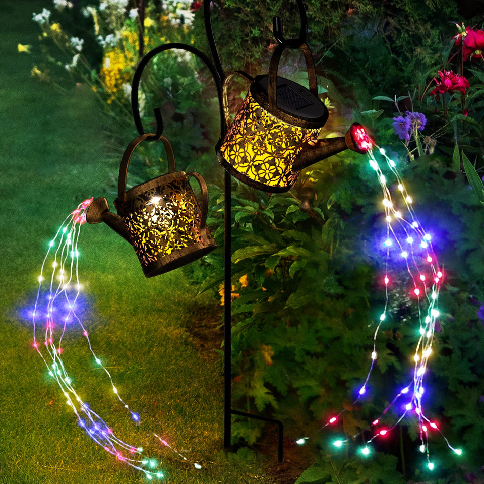 MEREAR solar watering can lights on patio glow with soft multi-color ambiance