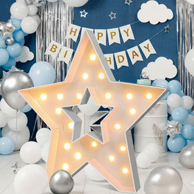 Merry Mosaics 3ft star marquee frame creates a dramatic backdrop for events.