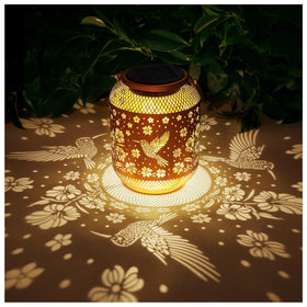 MESONDONA solar lantern with hummingbird pattern creates inviting outdoor ambiance