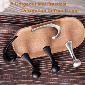 Metaliby brushed nickel towel hook adds modern storage in bathroom.