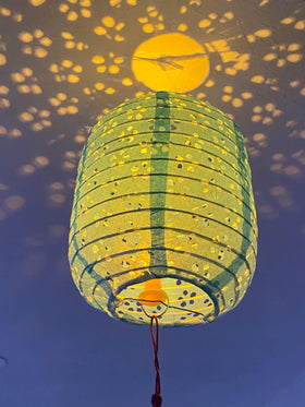 Metany orange lanterns kindle warm, inviting holiday atmospheres.