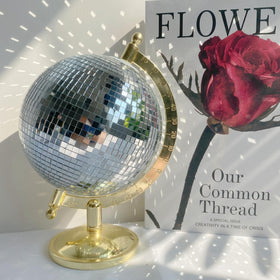 MFGDISCO disco ball globe silver ball with gold stand highlights surfaces.