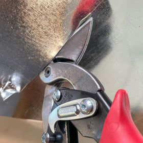 Midwest Snips comfortable grips support overhead tin cutting tasks.