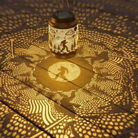 Miggley Bigfoot solar lantern enhances backyard décor with nature-inspired charm.