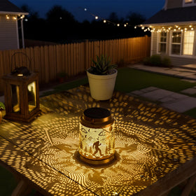 Miggley Bigfoot solar lantern on a tabletop adds subtle path-friendly glow.