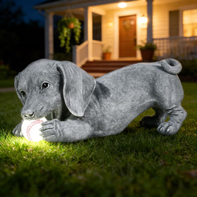 Dachshund silhouette adds character to any yard after dark.