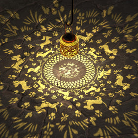 Miggley Dachshund Glow Lantern creates warm backyard ambiance.