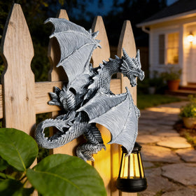 Miggley Dragon Tree Hugger solar panel glow for dusk ambience.