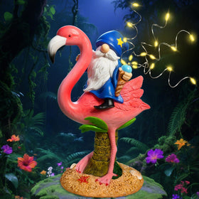 Miggley Flamingo Gnome Solar Statue at dusk adds garden whimsy.