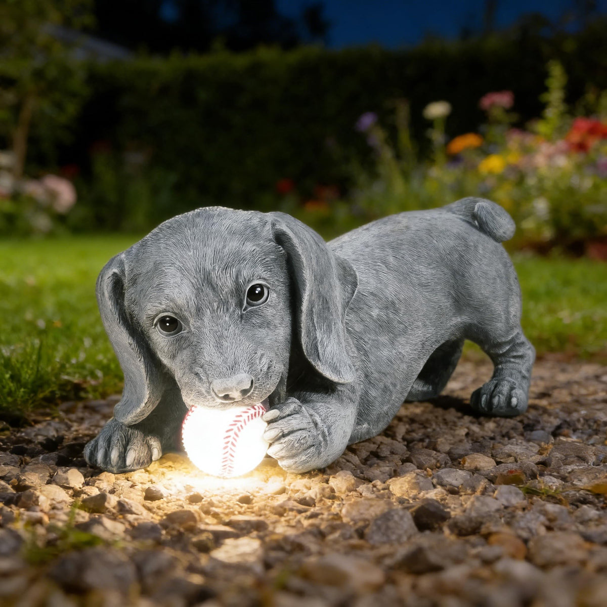 Glow from Miggley dachshund illuminates pathways at night.