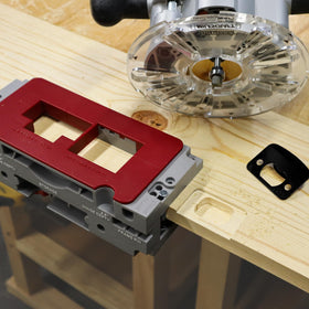 Milescraft 1229 HingeJigPLUS backset plug for latch positioning.