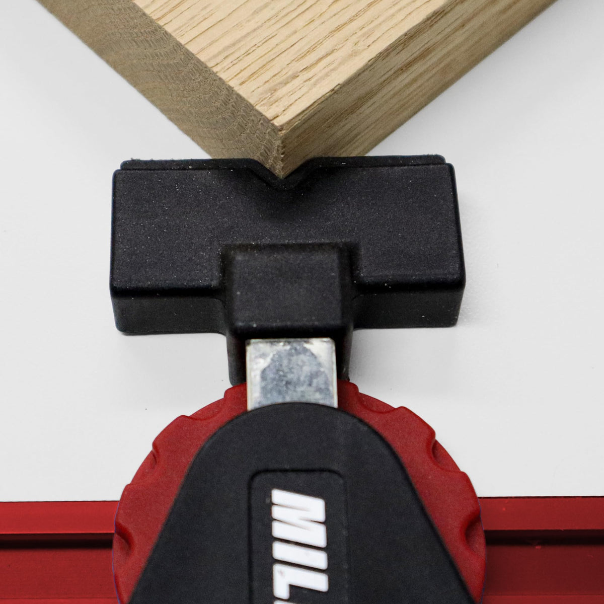 Milescraft 4030 with CamStops shows rear-edge support during clamping.