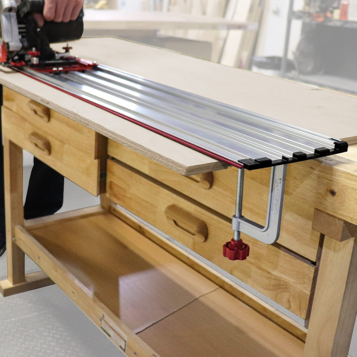 Milescraft red cutting-strip guides to reduce splintering and edge damage.