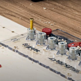 Milescraft ShelfJig included drill bits for 1/4 inch and 5 mm holes.
