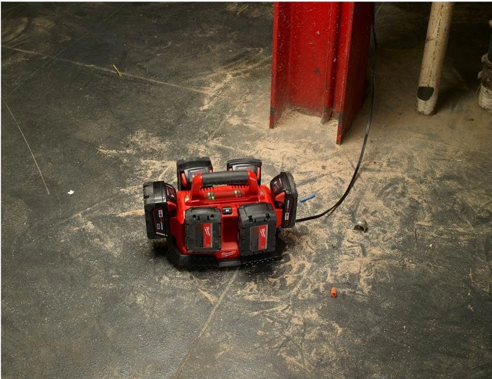 Milwaukee M18 sequential charger in use shows multiple packs charging efficiently.