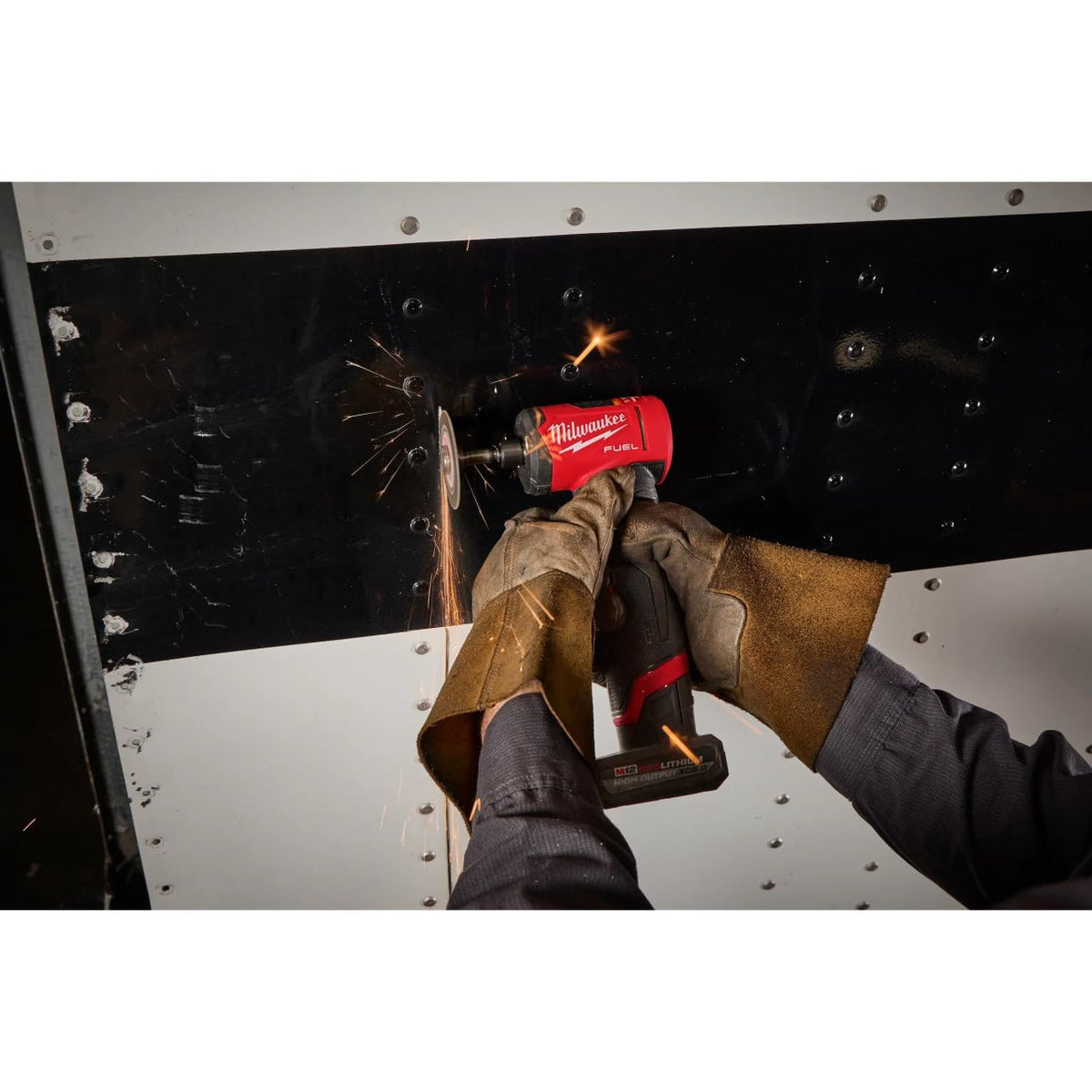 Ergonomic barrel grip on the Milwaukee M12 FUEL grinder for steady control.