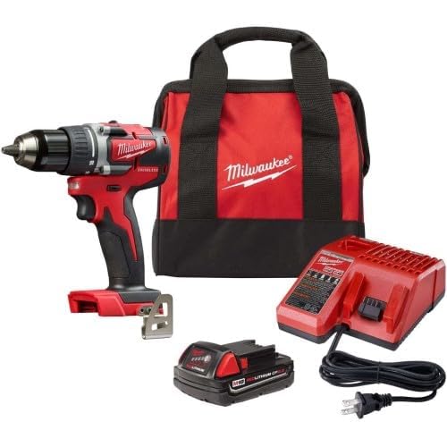 Milwaukee M18 compact drill in use for cabinet installation, showing torque and control.