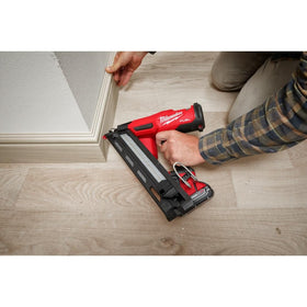 Milwaukee M18 FUEL 15-Gauge Finish Nailer in use on wood trim