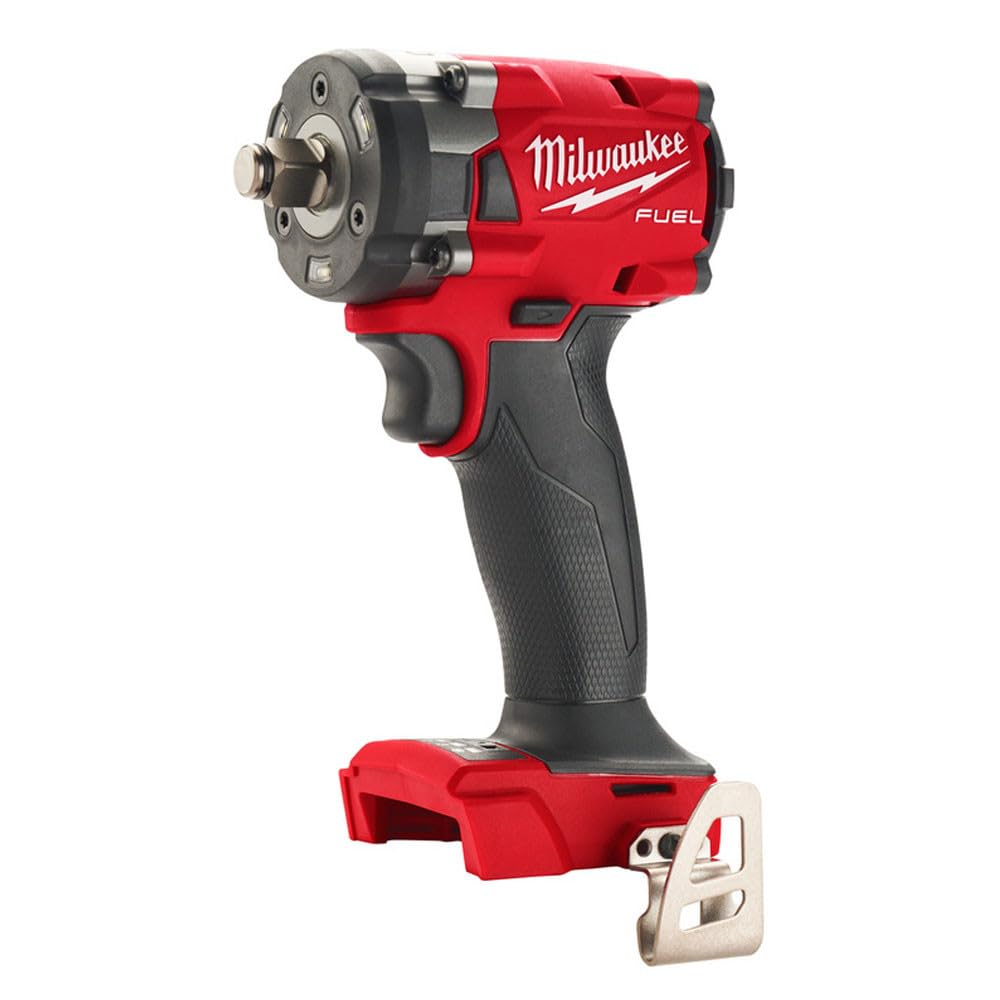Milwaukee M18 FUEL 3/8-inch compact impact wrench in bright workspace highlighting visibility.