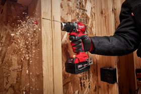 Milwaukee M18 Compact Brushless Hammer Drill-Driver with all-metal chuck for durability.