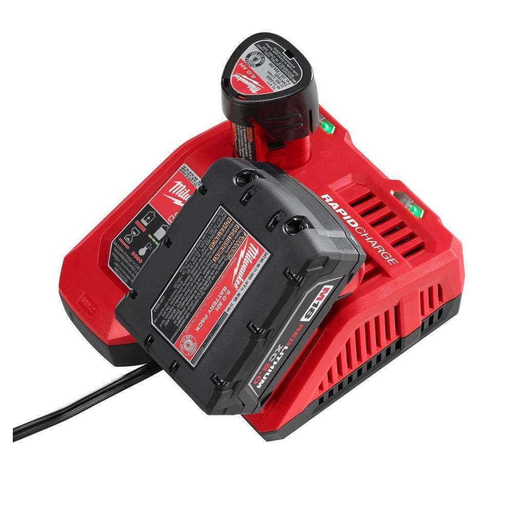 Milwaukee rapid charger in use demonstrating sequential charging across two batteries.
